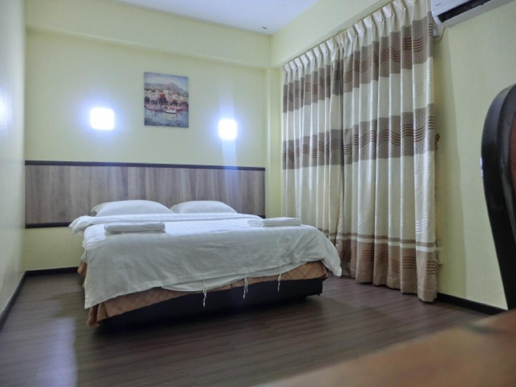 The Garden Inn Miri Room photo